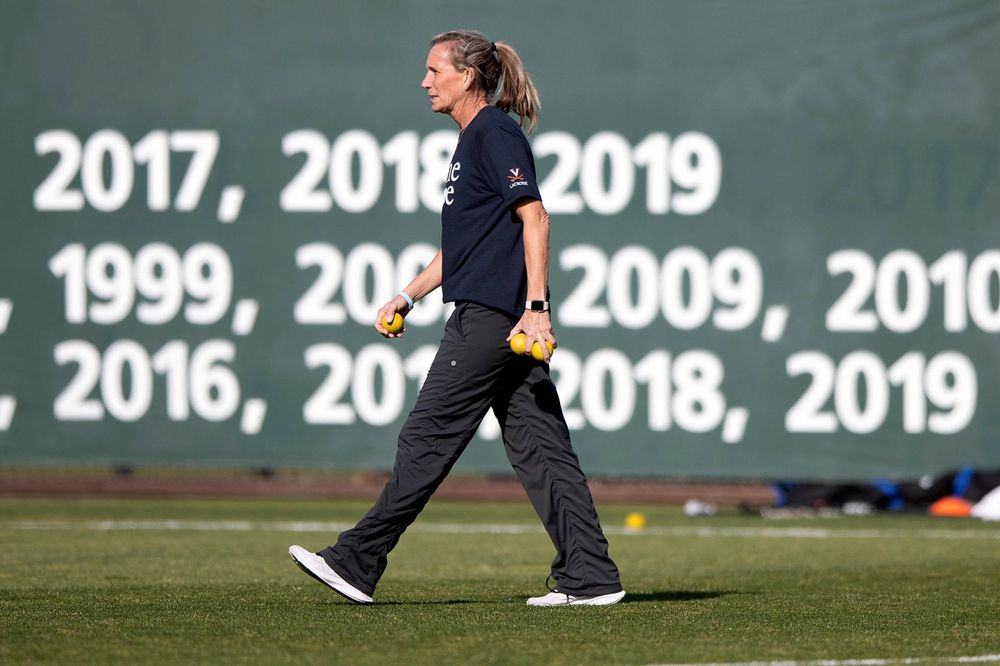 STANFORD, California - FEBRUARY 14:  Virginia Cavaliers head coach Julie Myers watches her team before the game against the Stanford Cardinal at Cagan Stadium on February 14, 2020 in Stanford, California. The Virginia Cavaliers defeated the Stanford Cardinal 12-11. (Photo by Jason O. Watson)