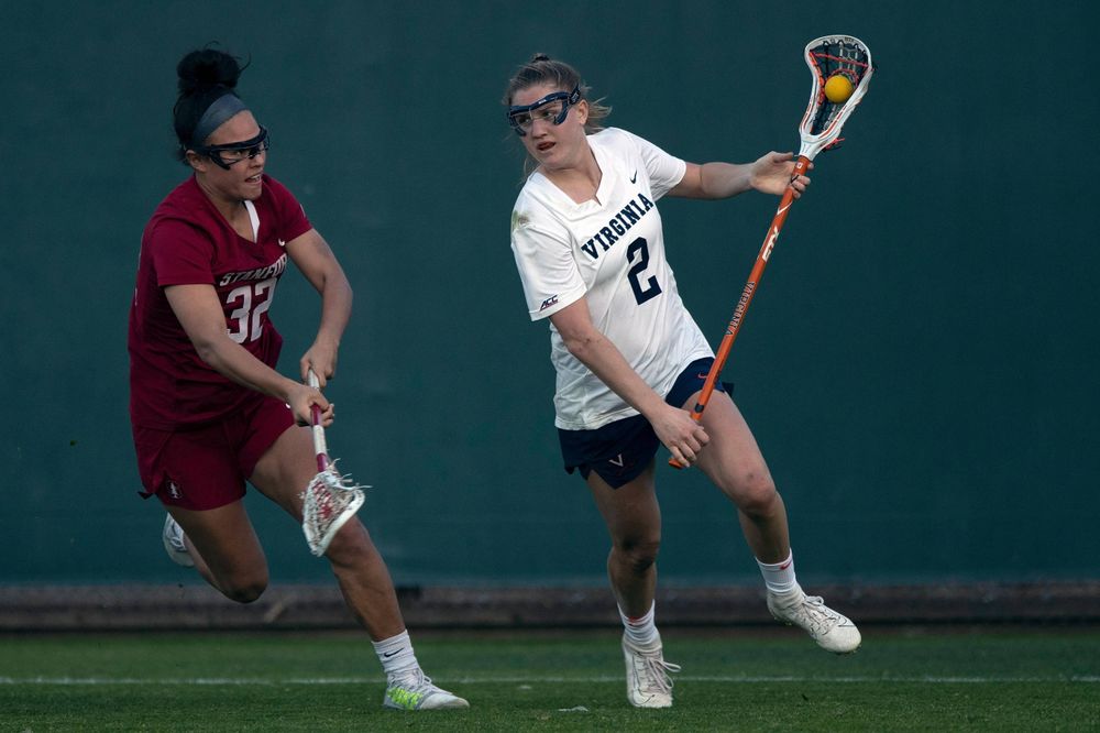STANFORD, California - FEBRUARY 14: Virginia Cavaliers midfield Sammy Mueller (2) is defended by Stanford Cardinal midfield Daniella McMahon (32) during the second half at Cagan Stadium on February 14, 2020 in Stanford, California. The Virginia Cavaliers defeated the Stanford Cardinal 12-11. (Photo by Jason O. Watson)