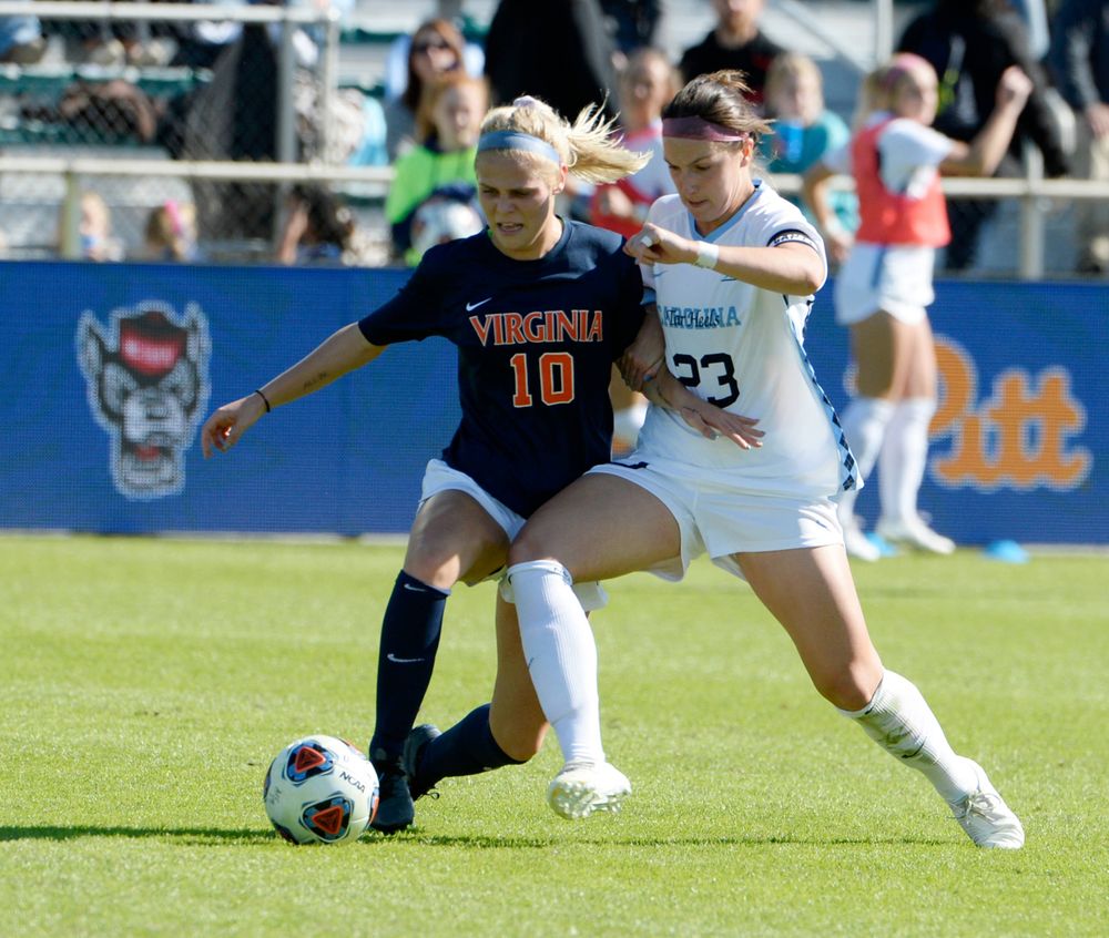 North Carolina's Lotte Wubben-Moy (23) pressures Virginia's Taryn Torres (10) during the 2019 ACC Women?s Soccer Championship at WakeMed Soccer Park in Cary, N.C., Sunday Nov. 10, 2019. (Photo by Sara D. Davis, the ACC)