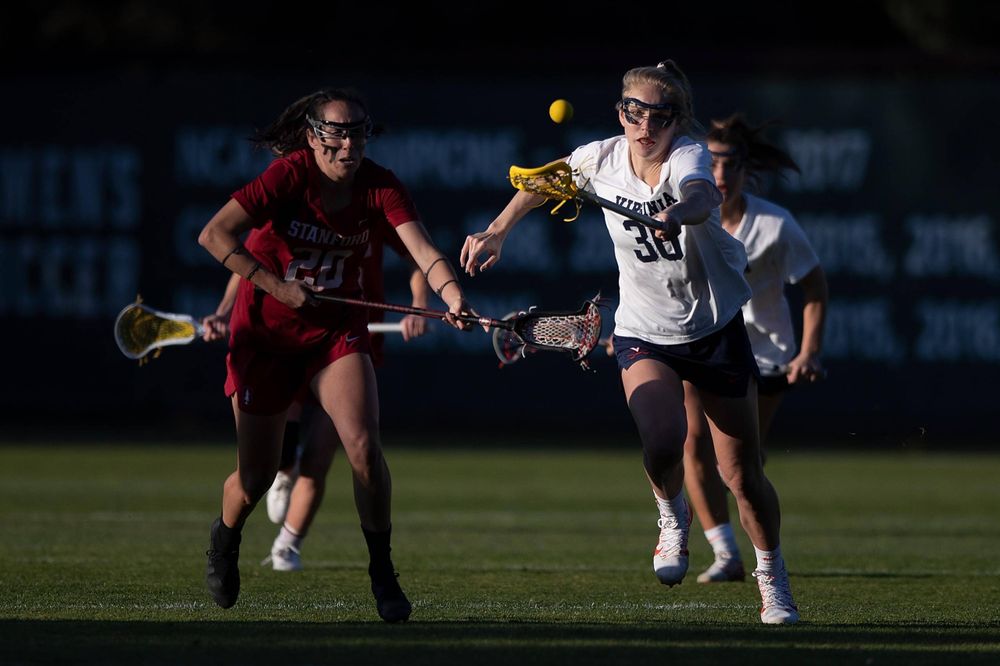 STANFORD, California - FEBRUARY 14:  Virginia Cavaliers midfield Anna Hauser (36) reaches for the ball after a draw with Stanford Cardinal midfield Genesis Lucero (20) during the second half at Cagan Stadium on February 14, 2020 in Stanford, California. The Virginia Cavaliers defeated the Stanford Cardinal 12-11. (Photo by Jason O. Watson)