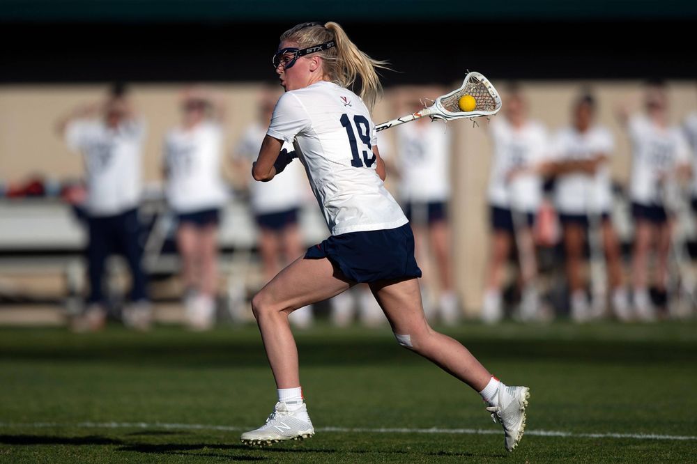 STANFORD, California - FEBRUARY 14:  Virginia Cavaliers midfield Annie Dyson (19) shoots against the Stanford Cardinal during the first half at Cagan Stadium on February 14, 2020 in Stanford, California. The Virginia Cavaliers defeated the Stanford Cardinal 12-11. (Photo by Jason O. Watson)