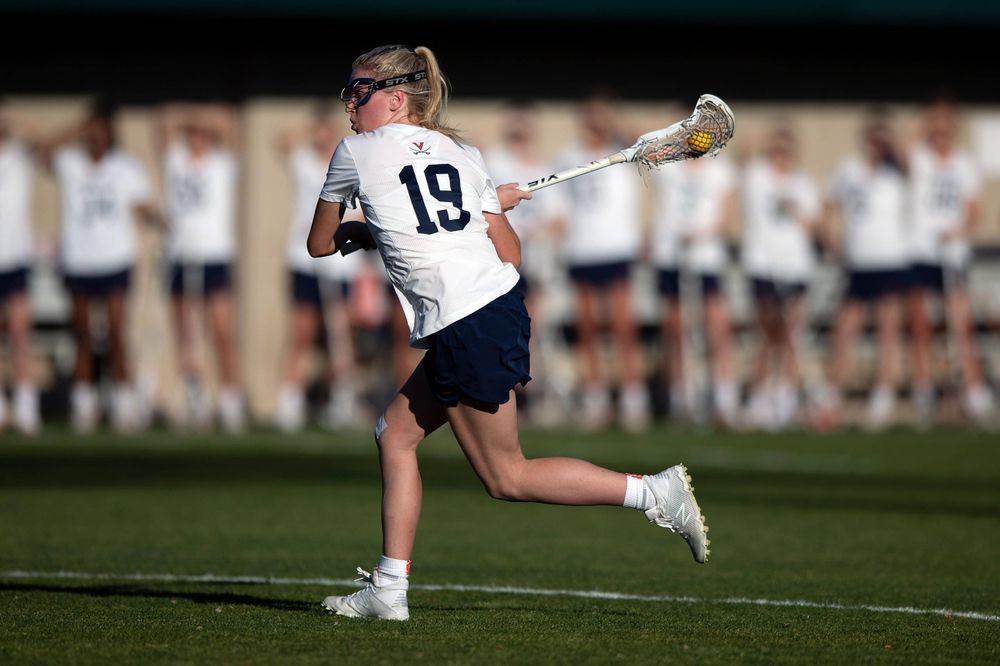 STANFORD, California - FEBRUARY 14:  Virginia Cavaliers midfield Annie Dyson (19) shoots against the Stanford Cardinal during the first half at Cagan Stadium on February 14, 2020 in Stanford, California. The Virginia Cavaliers defeated the Stanford Cardinal 12-11. (Photo by Jason O. Watson)