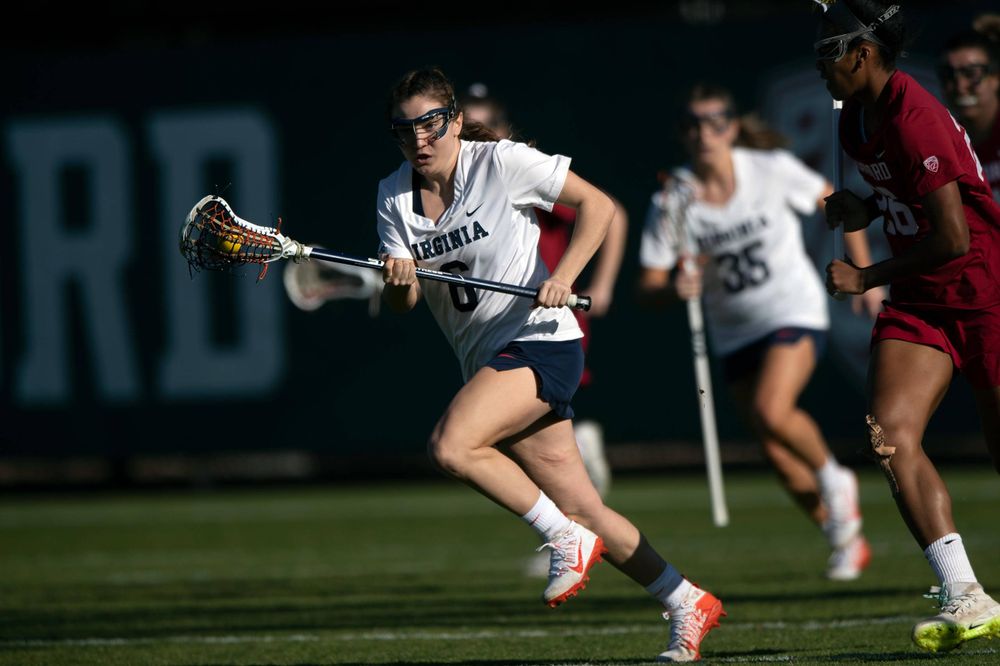 STANFORD, California - FEBRUARY 14:  Virginia Cavaliers midfield/defense Gwin Sinnott (6) runs up field against the Stanford Cardinal during the first half at Cagan Stadium on February 14, 2020 in Stanford, California. The Virginia Cavaliers defeated the Stanford Cardinal 12-11. (Photo by Jason O. Watson)