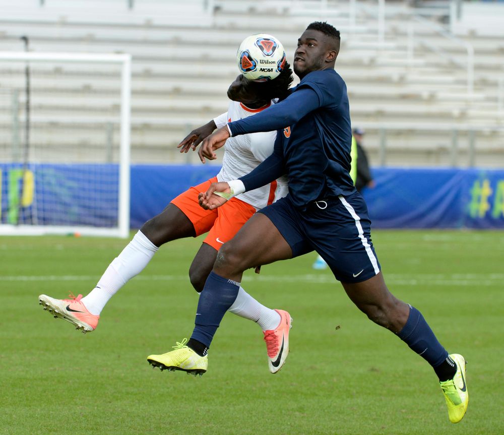 Clemson's Malick Mbaye (5) and Virginia's Daryl Dike (9) battle for the ball during the 2019 ACC Men?s Soccer Championship at WakeMed Soccer Park in Cary, N.C., Sunday Nov. 17, 2019. (Photo by Sara D. Davis, the ACC)