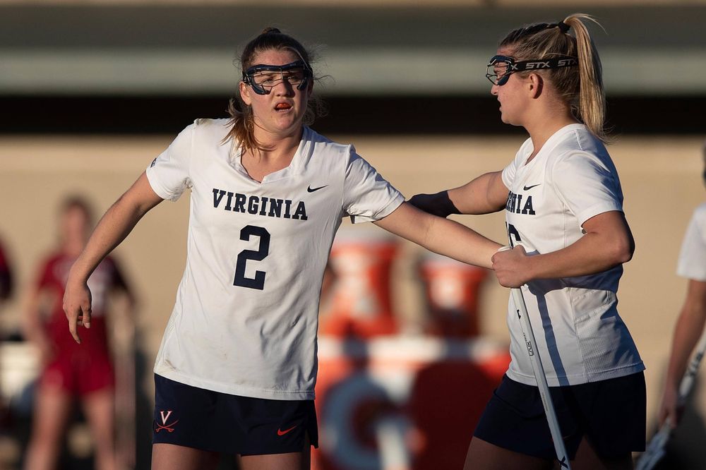 STANFORD, California - FEBRUARY 14:  Virginia Cavaliers midfield Sammy Mueller (2) is congratulated by midfield Ashlyn McGovern (16) after scoring a goal against the Stanford Cardinal during the second half at Cagan Stadium on February 14, 2020 in Stanford, California. The Virginia Cavaliers defeated the Stanford Cardinal 12-11. (Photo by Jason O. Watson)
