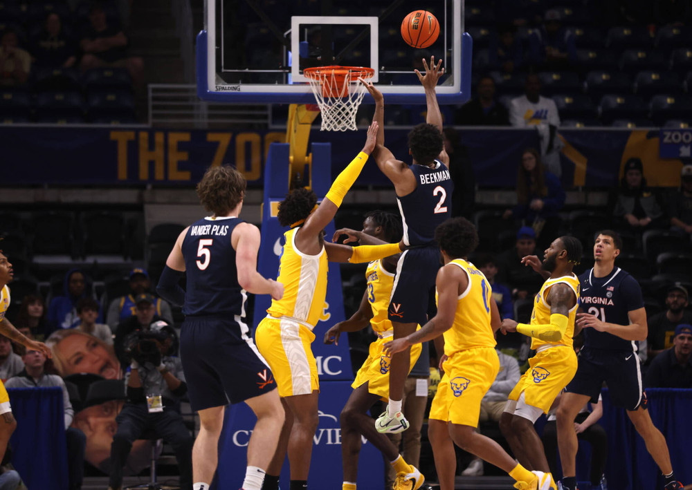 As Tony Bennett Closes in on UVA Wins Record, the Hollands Couldn't Be  Happier