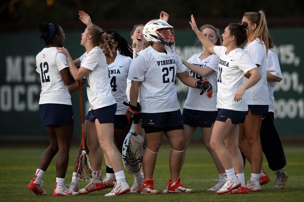 STANFORD, California - FEBRUARY 14:  Virginia Cavaliers goalkeeper Charlie Campbell (27) celebrates with teammates after the game against the Stanford Cardinal at Cagan Stadium on February 14, 2020 in Stanford, California. The Virginia Cavaliers defeated the Stanford Cardinal 12-11. (Photo by Jason O. Watson)